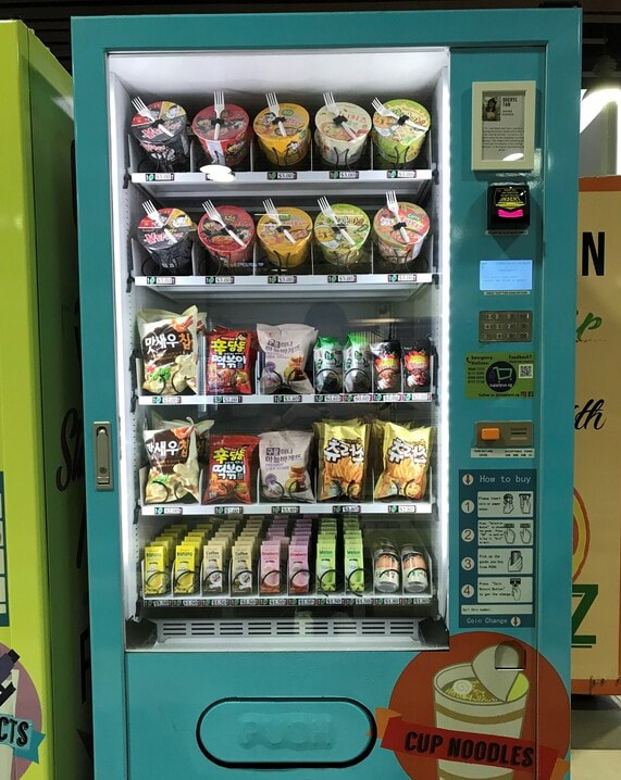 Vending machine selling Korean snacks and cup noodles